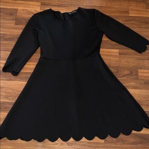 Scalloped black dress